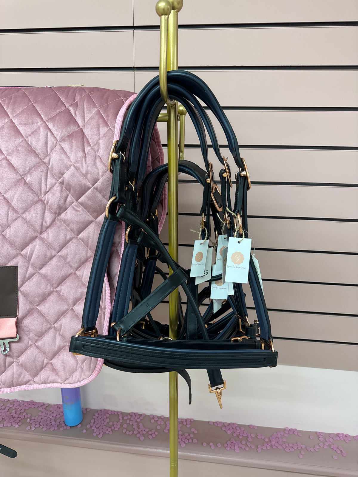 Beautiful black & brown leather head collars with pale pink or navy padding & navy rose gold buckles.