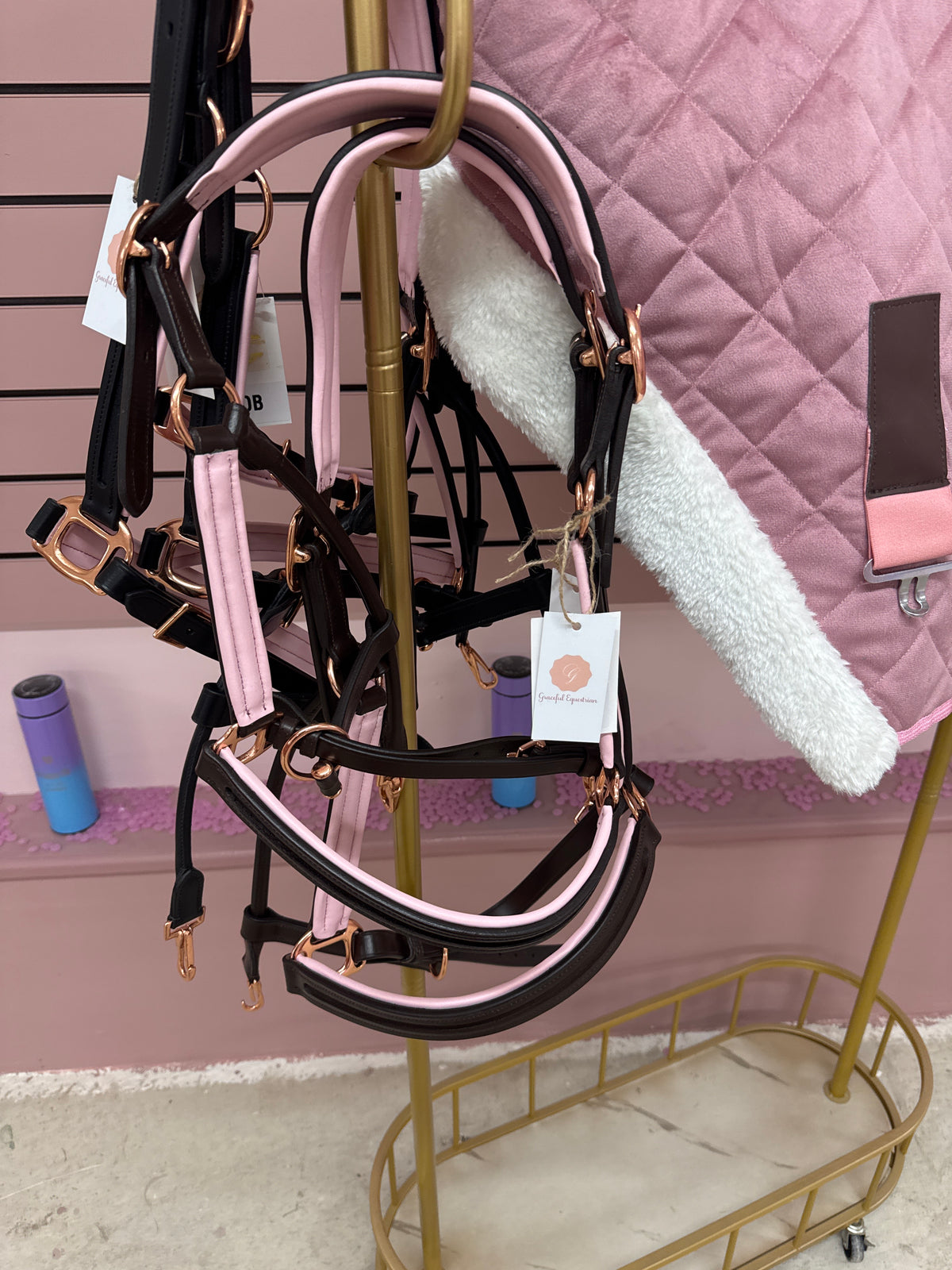 Beautiful black & brown leather head collars with pale pink or navy padding & navy rose gold buckles.