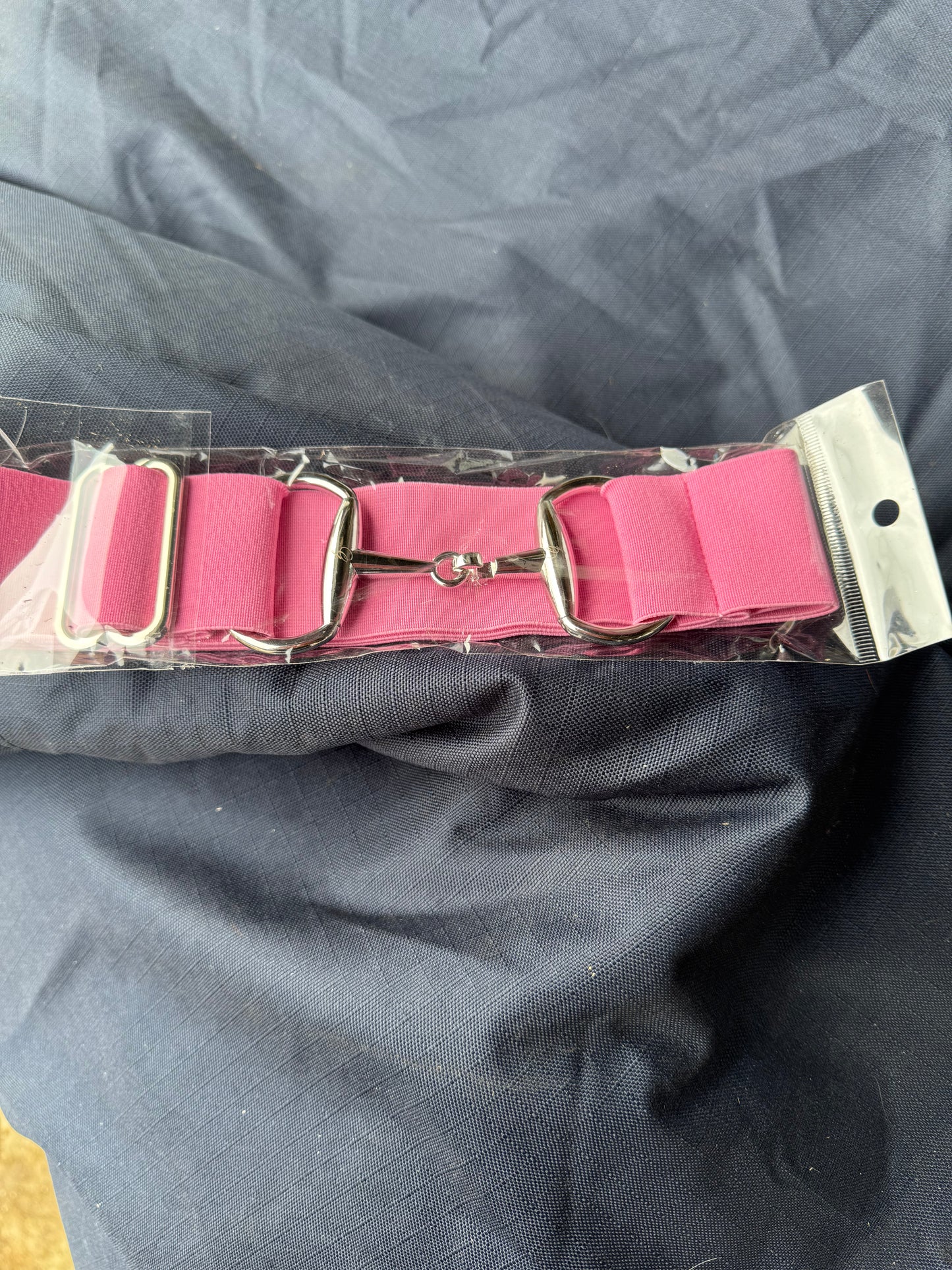 Surcingle belts with snaffle bit style hook fastenings