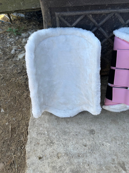 Soft pink brushing boots